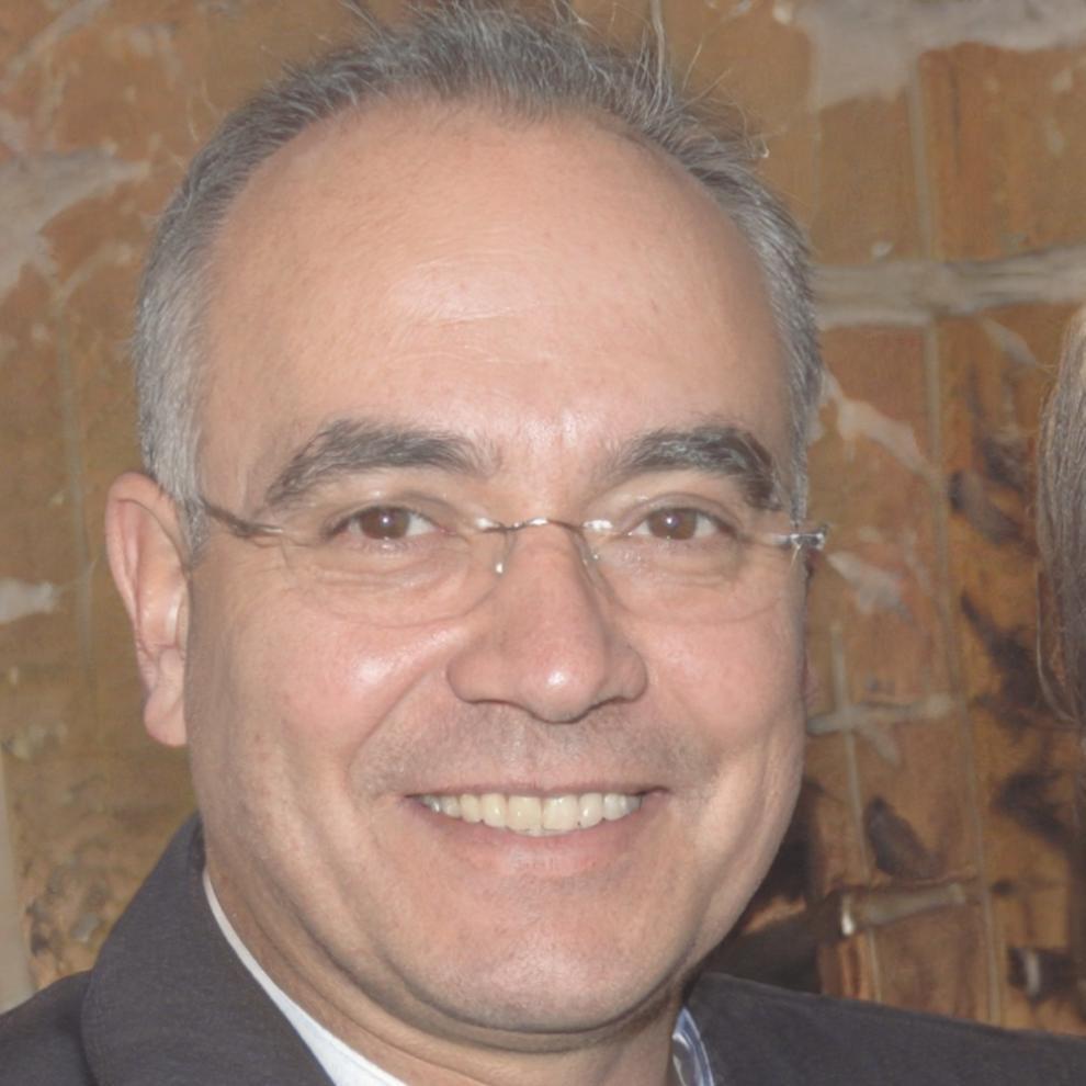 Professional headshot of finance communication instructor